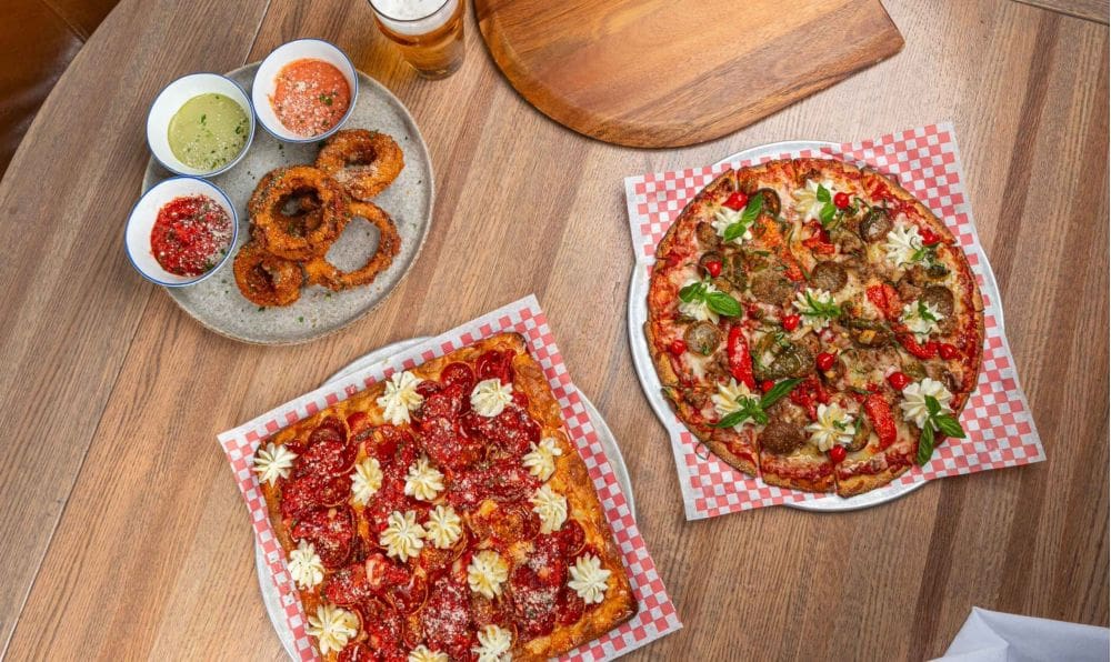 A few pizzas and the famous mozzarella onion rings at Professor Pizza